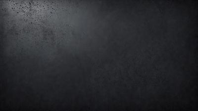 The primary subject of the image is a black background with a few specks of white. The setting is a dark room, and the visual style is a black and white photo. The colors and mood of the image are predominantly dark and moody, with the black background and specks of white creating a dramatic and mysterious atmosphere.