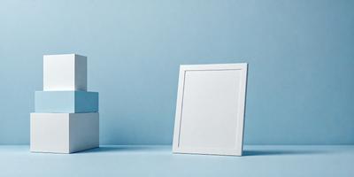 The primary subject of the image is a white picture frame. The setting is a blue background, which creates a contrasting and visually appealing scene. The visual style is a photo, capturing the details of the picture frame and the blue background. The colors and mood of the image are predominantly blue, giving it a calm and serene atmosphere.
