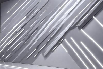 The primary subject of the image is a wall with a pattern of white and silver stripes. The setting is a room with a white wall, and the visual style appears to be a combination of digital art and illustration. The dominant colors are white and silver, creating a clean and modern atmosphere.