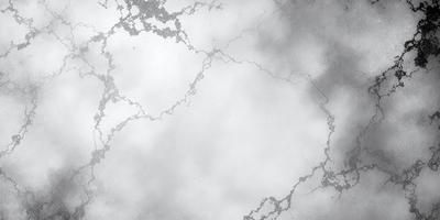 The primary subject of the image is a large, white, and cloudy surface. The setting is a cloudy sky, and the visual style is a photo. The dominant colors are white and gray, creating a moody atmosphere.
