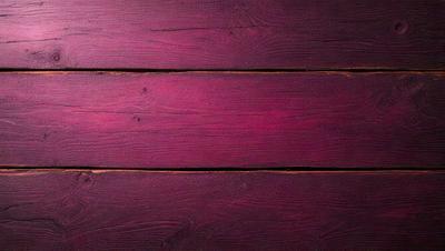 The primary subject of the image is a wooden floor with a purple color. The setting is a room with a wooden surface, and the visual style is a close-up of the wooden floor. The dominant colors are purple and brown, creating a warm and cozy atmosphere.