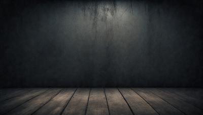 The primary subject of the image is a large, dark grey wall. The setting is a room with a wooden floor. The visual style is a black and white photo. The dominant colors are grey and black, creating a moody atmosphere.