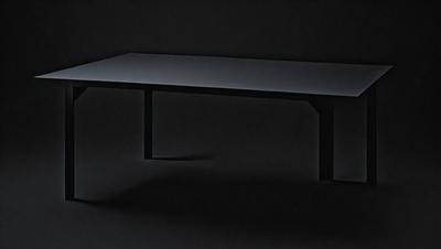 The primary subject of the image is a black table. The setting is a dark room, and the visual style appears to be a photo. The colors and mood of the image are predominantly dark, with the black table being the main focal point.