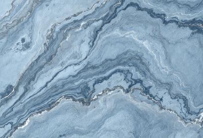 The primary subject of the image is a blue and white marble-like surface, which appears to be a patterned stone or a blue and white marble tile. The setting is a room with a blue and white marble wall, which adds to the overall atmosphere of the space. The visual style of the image is a close-up of the marble-like surface, showcasing its intricate patterns and textures. The colors and mood of the image are predominantly blue and white, creating a calm and serene