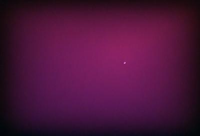 The primary subject of the image is a single star, which is located in the middle of the purple background. The setting appears to be a dark, starry sky, with the star being the main focus of the image. The visual style is a combination of a photo and a digital art, creating a unique and captivating atmosphere. The colors and mood of the image are predominantly purple, giving it a serene and peaceful ambiance.
