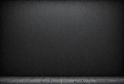 The primary subject of the image is a black wall with a wooden floor. The setting is a room with a black background, and the visual style is a photo. The colors and mood of the image are dark and moody, with the black wall and wooden floor creating a sense of depth and contrast.
