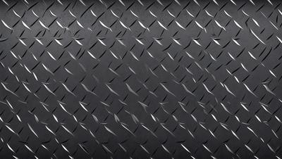 The primary subject of the image is a close-up of a metal surface, possibly a wall or a piece of artwork, with a pattern of metal plates or a metal-like texture. The setting appears to be a black background, which contrasts with the metal surface. The visual style of the image is a close-up, focusing on the intricate details of the metal surface. The colors in the image are predominantly black, giving the scene a bold and striking appearance.