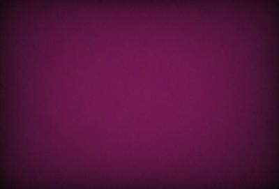 Purple background with no visible objects or textures.