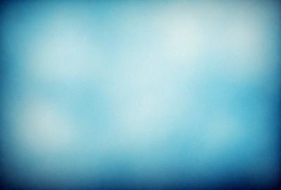 The primary subject of the image is a blue sky with clouds. The setting is a cloudy day, and the visual style is a photo. The dominant colors are blue and white, creating a calm and serene atmosphere.