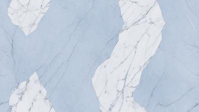 The primary subject of the image is a marble wall with a blue and white color scheme. The setting is a room with a marble floor, and the visual style is a close-up of the marble wall. The colors and mood of the image are predominantly blue and white, creating a clean and elegant atmosphere.