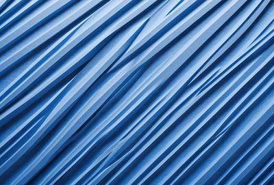 The primary subject of the image is a blue wall with a pattern of wavy lines. The setting is a room with a blue wall, and the visual style appears to be a digital art or illustration. The dominant colors are blue and white, creating a calm and soothing atmosphere.