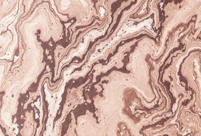 The image features a marbled surface with a brown and white color scheme. The marbled pattern creates a visually appealing and textured surface. The primary subject of the image is the marbled surface, which serves as the main object, scene, or focus of the image. The setting or background is the marbled surface itself, and the visual style is a close-up of the marbled pattern. The colors and mood of the image are predominantly brown and white, giving it a warm and natural atmosphere.