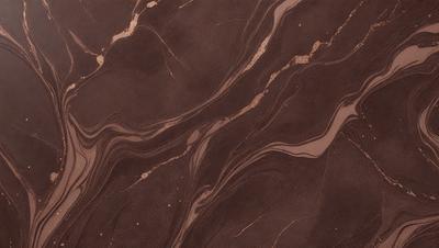 The primary subject of the image is a close-up of a marble countertop. The setting is a kitchen, with the countertop being the main focus of the scene. The visual style is a photo, capturing the natural texture and patterns of the marble. The colors and mood of the image are predominantly brown, giving it a warm and earthy atmosphere.