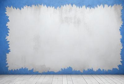 The primary subject of the image is a white wall with a blue border. The setting is a room with a wooden floor. The visual style is a photo, and the colors and mood are predominantly white and blue, creating a clean and calm atmosphere.