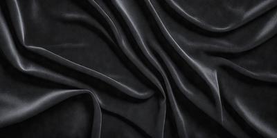 The primary subject of the image is a close-up of a black fabric, possibly a piece of velvet or a curtain. The setting is a dark background, which emphasizes the fabric's texture and color. The visual style is a close-up, focusing on the details of the fabric. The colors and mood of the image are predominantly dark, with the black fabric being the main focus.