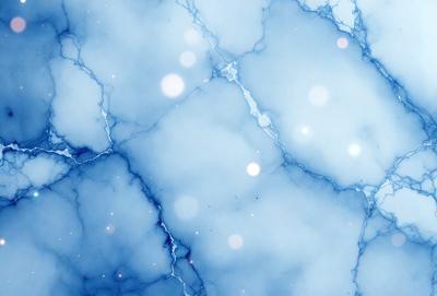 The primary subject of the image is a blue marble wall with white spots. The setting is a room with a blue marble wall, and the visual style is a photo. The dominant colors are blue and white, creating a calm and serene atmosphere.