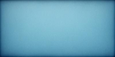The primary subject of the image is a blue background. The setting is a large, empty space with no visible objects or people. The visual style is a close-up of the blue background, which gives a sense of depth and focus to the image. The colors and mood are predominantly blue, creating a calm and serene atmosphere.