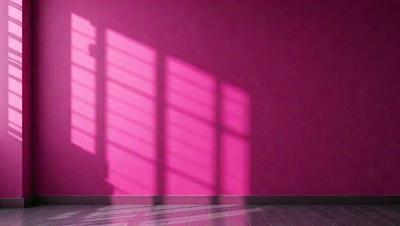 The primary subject of the image is a pink wall with a window. The setting is a room with a pink wall and a window. The visual style is a photo of a pink wall with a window. The colors and mood are predominantly pink, creating a warm and inviting atmosphere.