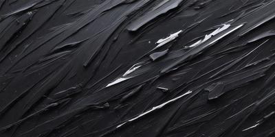 The primary subject of the image is a black and white painting of a wave. The setting is a black background, and the visual style is a painting. The dominant colors are black and white, creating a dramatic and moody atmosphere.