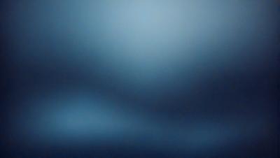 The primary subject of the image is a blue sky with a few clouds. The setting is a clear blue sky, and the visual style is a photo. The colors and mood of the image are predominantly blue, creating a calm and serene atmosphere.