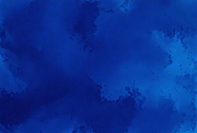 The primary subject of the image is a blue sky with a few stars visible. The setting is a cloudy sky, and the visual style appears to be a photo. The dominant colors are blue and white, creating a calm and serene atmosphere.