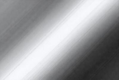 The primary subject of the image is a long, white line. The setting is a black and white background, which gives the image a classic and timeless appearance. The visual style is a combination of a photo and a drawing, creating a unique and artistic representation of the white line. The colors and mood of the image are predominantly black and white, with a sense of simplicity and elegance.