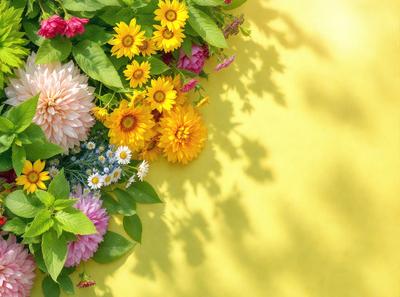 The primary subject of the image is a bouquet of flowers, which are arranged in a vase and placed on a yellow background. The flowers are a mix of pink and yellow, creating a vibrant and cheerful atmosphere. The setting appears to be a studio or a controlled environment, as the flowers are carefully arranged and the background is consistent. The visual style of the image is a combination of photo and digital art, as the flowers are depicted in a realistic manner while the background is painted in a consistent color.