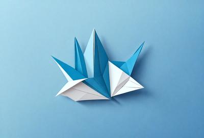 The primary subject of the image is a blue and white paper crane. The setting is a blue background, and the visual style is a digital art or illustration. The colors and mood of the image are predominantly blue and white, creating a calm and serene atmosphere.