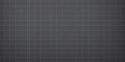 The primary subject of the image is a gray wall with a pattern of squares. The setting is a room with a gray background. The visual style is a close-up of the gray wall, which gives a sense of texture and pattern. The colors and mood of the image are predominantly gray, creating a calm and neutral atmosphere.