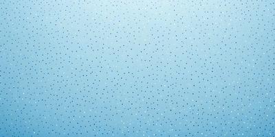 The primary subject of the image is a blue wall with a pattern of white dots. The setting is a room with a blue background, and the visual style appears to be a photo. The dominant colors are blue and white, creating a calm and soothing atmosphere.