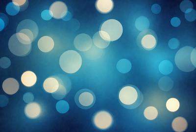 The primary subject of the image is a blue background with a pattern of white lights. The setting appears to be a dark room, and the visual style is a digital art or illustration. The dominant colors are blue and white, creating a calm and serene atmosphere.