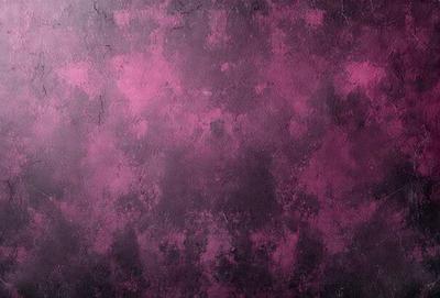 The primary subject of the image is a purple wall with a pinkish hue. The setting is a room with a gray background. The visual style is a close-up of the wall, showcasing its texture and color. The dominant colors are purple and pink, creating a warm and inviting atmosphere.