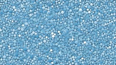 The primary subject of the image is a blue background with a pattern of white circles. The setting appears to be a wall or a surface with a blue color scheme. The visual style of the image is a close-up of the blue and white circles, creating a visually appealing and intricate pattern. The colors and mood of the image are predominantly blue and white, giving it a calm and serene atmosphere.