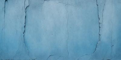 The primary subject of the image is a blue wall with a few white spots on it. The setting is a room with a blue wall, and the visual style is a close-up of the wall. The colors and mood of the image are predominantly blue, with a few white spots adding contrast.