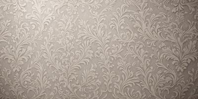 The primary subject of the image is a wallpaper with a floral pattern. The wallpaper features a white background with intricate designs and patterns. The setting is a room with a white wall, and the visual style is a close-up of the wallpaper. The colors and mood of the image are predominantly white, giving it a clean and elegant appearance.