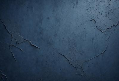 The primary subject of the image is a blue wall with a textured surface. The setting is a room with a blue background. The visual style is a close-up of the wall, showcasing its texture and color. The dominant colors are blue and grey, creating a calm and serene atmosphere.