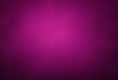 The primary subject of the image is a purple background. The setting is a dark, pinkish background that contrasts with the purple. The visual style is a close-up of the purple background, which gives a sense of depth and texture. The colors and mood of the image are predominantly purple, creating a calm and serene atmosphere.