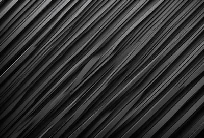The primary subject of the image is a black and white pattern, which appears to be a wallpaper or a design. The setting is a black background, which contrasts with the pattern. The visual style is a close-up of the pattern, showcasing its details. The colors and mood of the image are predominantly black and white, giving it a classic and timeless appearance.