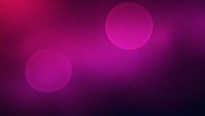The primary subject of the image is a purple background with three pink circles. The setting is a dark room, and the visual style appears to be a digital art or illustration. The dominant colors are purple and pink, creating a mood of calmness and tranquility.