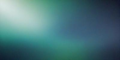 The primary subject of the image is a green background, which appears to be a wall or a surface. The setting is a dark room, and the visual style is a close-up of the green background. The colors and mood of the image are predominantly green, creating a calm and serene atmosphere.