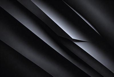 The primary subject of the image is a black and white photo of a wall with a pattern of vertical lines. The setting is a dark room, and the visual style is a close-up of the wall. The dominant colors are black and white, creating a moody atmosphere.