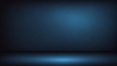 The primary subject of the image is a blue wall. The setting is a dark room with a blue background. The visual style is a photo, and the dominant colors are blue and black. The overall atmosphere is calm and serene.