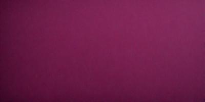 The primary subject of the image is a large, purple wall. The setting is a room with a purple background, which creates a unique and striking visual effect. The visual style of the image is a close-up of the purple wall, emphasizing its color and texture. The dominant colors in the image are purple, which creates a calm and soothing atmosphere.