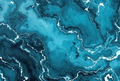 The primary subject of the image is a blue and white ocean scene with a variety of swirls and patterns. The setting is the ocean, and the visual style appears to be a combination of a photo and digital art. The dominant colors are blue and white, creating a serene and calming atmosphere.