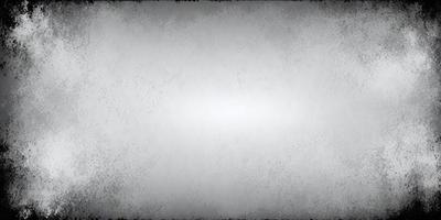 The image is a black and white photo of a white wall. The wall appears to be textured, giving it a unique appearance. The primary subject is the white wall, which serves as the main focus of the image. The setting is a simple, plain wall, with no additional elements or background visible. The visual style is a black and white photo, which adds a timeless and classic feel to the image. The colors and mood are predominantly neutral, with the white wall being the main element that stands out in the scene.