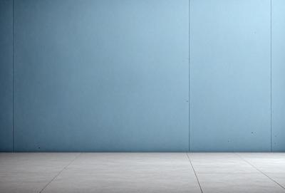 The primary subject of the image is a blue wall. The setting is a room with a blue wall, and the visual style is a photo. The dominant colors are blue and white, creating a calm and serene atmosphere.