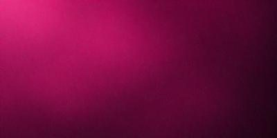 The primary subject of the image is a large, pink wall. The setting is a room with a pink background, and the visual style is a close-up of the wall. The dominant colors in the image are pink, and the overall atmosphere is warm and inviting.