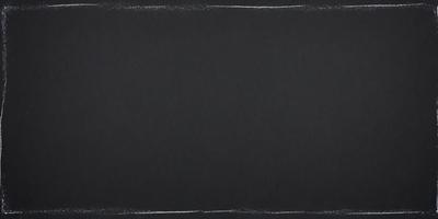 The primary subject of the image is a black background with a white line. The setting is a dark room, and the visual style is a black and white photo. The colors and mood of the image are predominantly dark and moody, with the white line adding a touch of contrast.