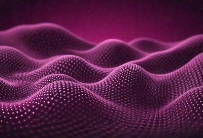 The primary subject of the image is a purple surface with a pattern of dots. The setting appears to be a dark room, and the visual style is a combination of a photo and digital art. The dominant colors are purple and black, creating a moody atmosphere.