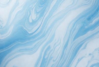 The primary subject of the image is a blue and white ocean wave. The setting is the ocean, with the wave rolling in. The visual style is a photo of the ocean, capturing the beauty of the waves. The dominant colors are blue and white, creating a serene and calming atmosphere.